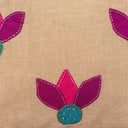 Handmade cream cotton cushion cover with traditional applique work
