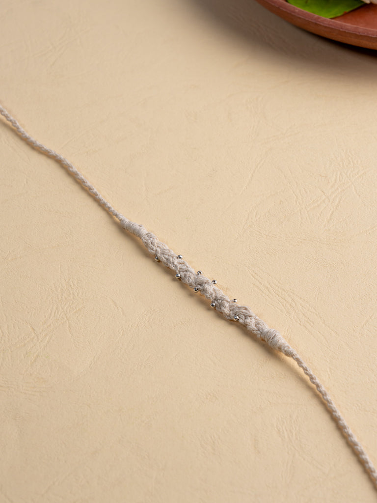 Twisted Elegant White Rakhi