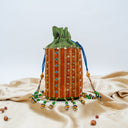 Green Mashru Potli with Orange Stripe | Bead & Brass Tikki Handwork | Gramshree