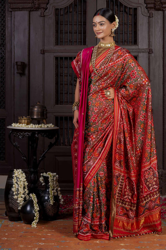Handcrafted Green Patola Silk Saree With Khat Embroidery