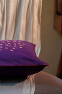 Handmade purple embroidered cotton cushion cover for bedroom décor
