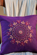 Handcrafted purple cotton cushion cover with traditional handwork
