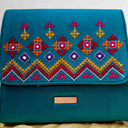 Handmade mint Rabari sling bag with bead and thread work
