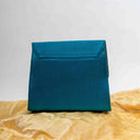 Mint handcrafted sling bag with mirror shell and bead detailing
