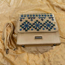 Ivory Triangular Rabari Sling Bag with Mirror, Shell & Bead Handwork