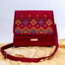 Pink triangular wave Rabari sling bag with mirror and shell handwork
