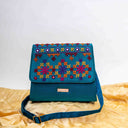 Mint Triangular Rabari Sling Bag with Mirror, Shell & Bead Handwork