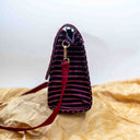 Pink triangular ethnic sling bag by Gramshree
