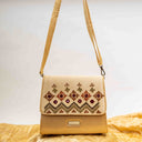 Ivory Triangular Wave Rabari Sling Bag with Mirror, Shell & Bead Handwork