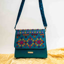 Mint Triangular Rabari Sling Bag with Mirror, Shell & Bead Handwork