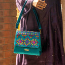 Mint Triangular Rabari Sling Bag with Mirror, Shell & Bead Handwork