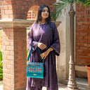 Mint Triangular Rabari Sling Bag with Mirror, Shell & Bead Handwork