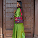 Pink Triangular Rabari Sling Bag with Mirror, Shell & Bead Handwork