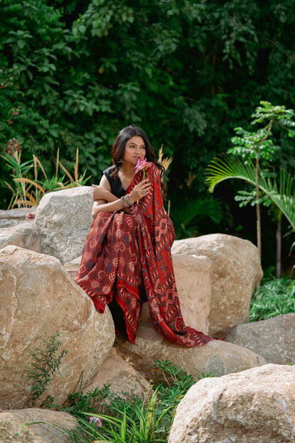Orange-Black Ajrakh Modal Saree With Tassels