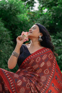 Orange-Black Ajrakh Modal Saree With Tassels