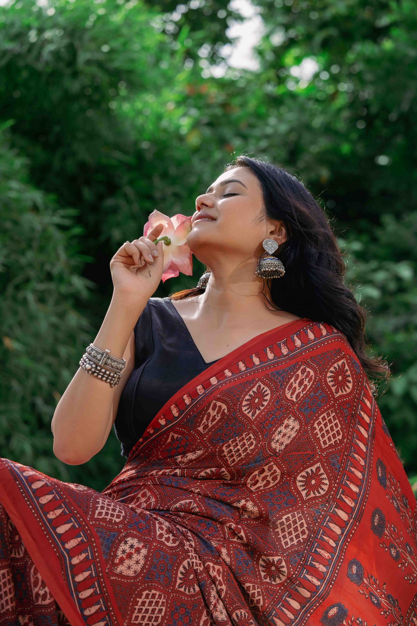 Orange-Black Ajrakh Modal Saree With Tassels