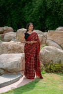 Orange-Black Ajrakh Modal Saree With Tassels