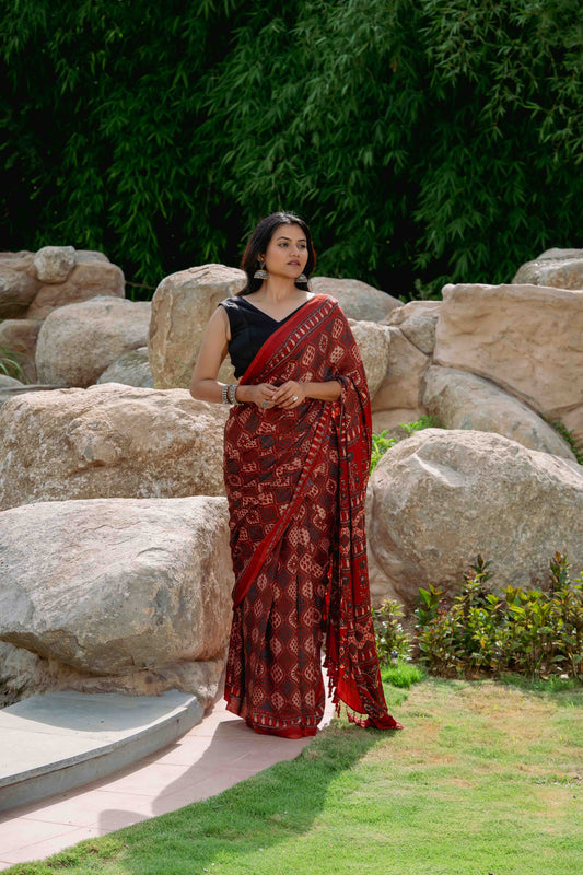 Orange-Black Ajrakh Modal Saree With Tassels
